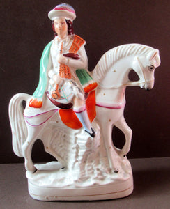 Antique Staffordshire on Scottish Horseman Playing the Bagpipes