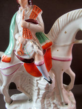 Load image into Gallery viewer, Antique Staffordshire on Scottish Horseman Playing the Bagpipes
