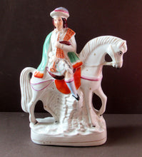 Load image into Gallery viewer, Antique Staffordshire on Scottish Horseman Playing the Bagpipes
