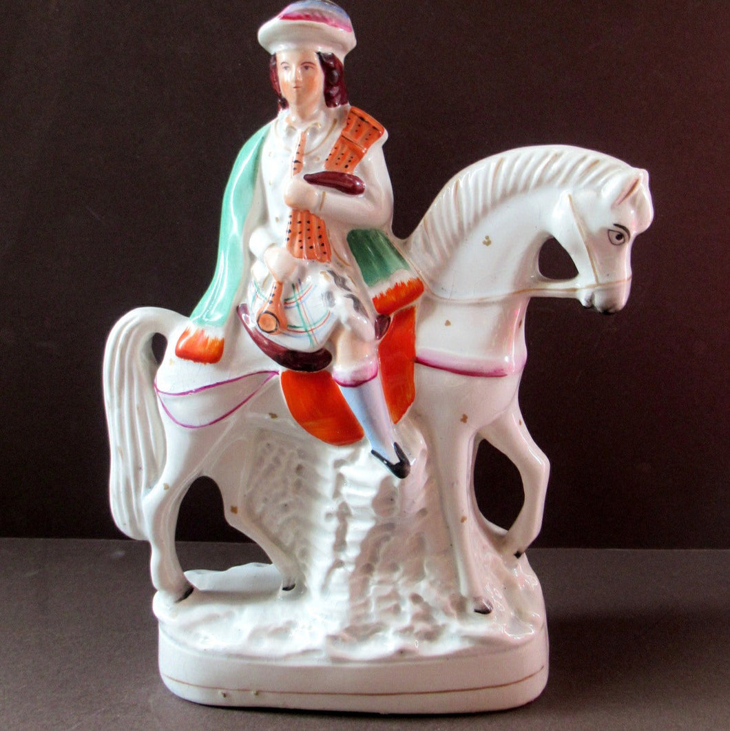 Antique Staffordshire on Scottish Horseman Playing the Bagpipes