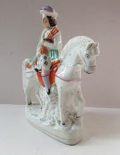 Load image into Gallery viewer, Antique Staffordshire on Scottish Horseman Playing the Bagpipes
