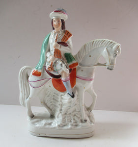 Antique Staffordshire on Scottish Horseman Playing the Bagpipes