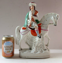 Load image into Gallery viewer, Antique Staffordshire on Scottish Horseman Playing the Bagpipes
