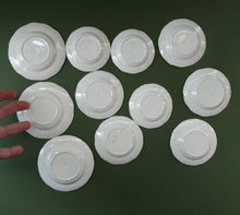 Load image into Gallery viewer, RARE Antique Lot of Transfer Printed MINATURE Child&#39;s Nursery Round Plates. Green Stars Pattern
