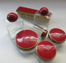 Load image into Gallery viewer, 1950s Red Enamel Topped and Glass Vanity Pots and Bottles. Vintage Glamour

