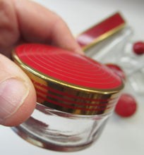 Load image into Gallery viewer, 1950s Red Enamel Topped and Glass Vanity Pots and Bottles. Vintage Glamour
