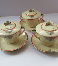 Load image into Gallery viewer, Royal Doulton 1930s Art Deco Royal Tango Lidded Cup and Saucer
