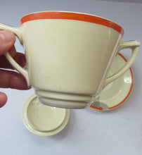 Load image into Gallery viewer, Royal Doulton 1930s Art Deco Royal Tango Lidded Cup and Saucer
