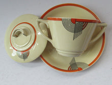 Load image into Gallery viewer, Royal Doulton 1930s Art Deco Royal Tango Lidded Cup and Saucer
