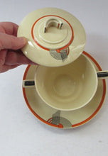 Load image into Gallery viewer, Royal Doulton 1930s Art Deco Royal Tango Lidded Cup and Saucer
