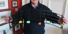 Load image into Gallery viewer, Vintage 1950s Wire Work Coat rack with Musical Notes in Coloured Plastic
