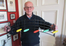 Load image into Gallery viewer, Vintage 1950s Wire Work Coat rack with Musical Notes in Coloured Plastic
