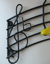 Load image into Gallery viewer, Vintage 1950s Wire Work Coat rack with Musical Notes in Coloured Plastic
