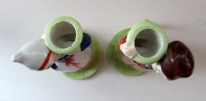 Dutch Boy and Girl Pair of Art Deco Candlesticks