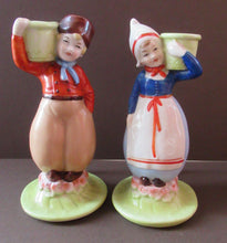 Load image into Gallery viewer, Dutch Boy and Girl Pair of Art Deco Candlesticks
