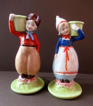Load image into Gallery viewer, Dutch Boy and Girl Pair of Art Deco Candlesticks
