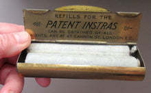 Load image into Gallery viewer, Victorian Tin with Original Contents. Charcoal Refills for the INSTRA HAND WARMER
