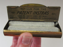 Load image into Gallery viewer, Victorian Tin with Original Contents. Charcoal Refills for the INSTRA HAND WARMER
