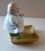 Load image into Gallery viewer, Antique Porcelain Nodder or Swinger Pin Tray by Schafer &amp; Vater. Wee Pig Dressed as Lady 
