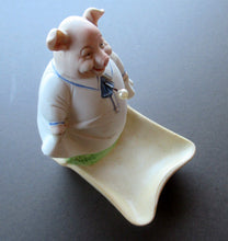 Load image into Gallery viewer, Antique Porcelain Nodder or Swinger Pin Tray by Schafer &amp; Vater. Wee Pig Dressed as Lady 
