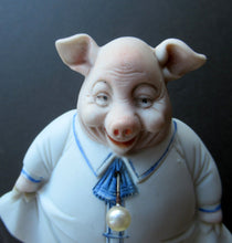 Load image into Gallery viewer, Antique Porcelain Nodder or Swinger Pin Tray by Schafer &amp; Vater. Wee Pig Dressed as Lady 
