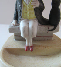 Load image into Gallery viewer, Antique Porcelain Nodder or Swinger Pin Tray by Schafer &amp; Vater. Boy Wearing Yellow Straw Hat with Black Cat
