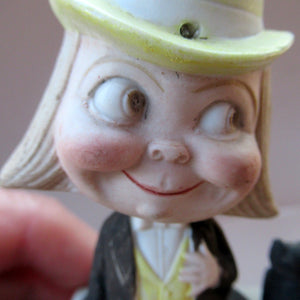 Antique Porcelain Nodder or Swinger Pin Tray by Schafer & Vater. Boy Wearing Yellow Straw Hat with Black Cat