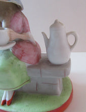Load image into Gallery viewer, Antique Porcelain Nodder Figurine by Schafer &amp; Vater. Old Lady in Garden Drinking Tea 

