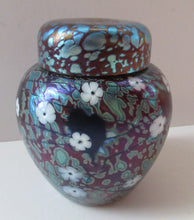 Load image into Gallery viewer, Vintage Okra Glass Ginger Jar Iridescent Finish and White Flowers. Signed
