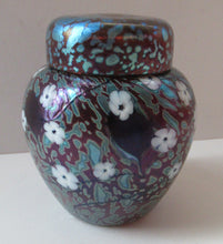 Load image into Gallery viewer, Vintage Okra Glass Ginger Jar Iridescent Finish and White Flowers. Signed
