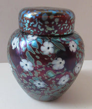 Load image into Gallery viewer, Vintage Okra Glass Ginger Jar Iridescent Finish and White Flowers. Signed
