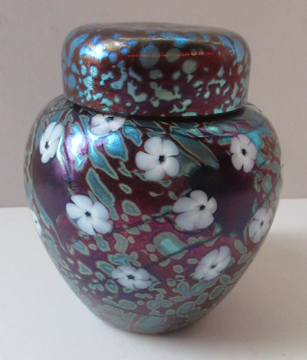 Vintage Okra Glass Ginger Jar Iridescent Finish and White Flowers. Signed