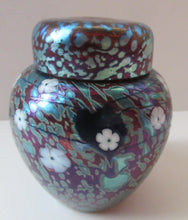 Load image into Gallery viewer, Vintage Okra Glass Ginger Jar Iridescent Finish and White Flowers. Signed
