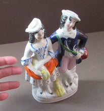 Load image into Gallery viewer, ANTIQUE Victorian Staffordshire Flatback Figurine. Miniature Example of a Man and Woman Gathering Wheat
