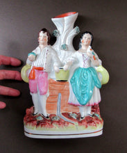 Load image into Gallery viewer, Victorian Staffordshire Spill Vase Flatback. Couple at a Water Well
