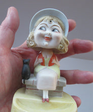 Load image into Gallery viewer, Antique Porcelain Nodder or Swinger Pin Tray by Schafer &amp; Vater. Girl in Bonnet with Black Cat 
