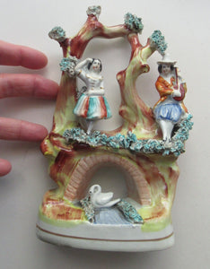 Antique Miniature Staffordshire Figure. Couple Making Music. Swan in River