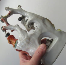 Load image into Gallery viewer, Antique Miniature Staffordshire Figure. Couple Making Music. Swan in River
