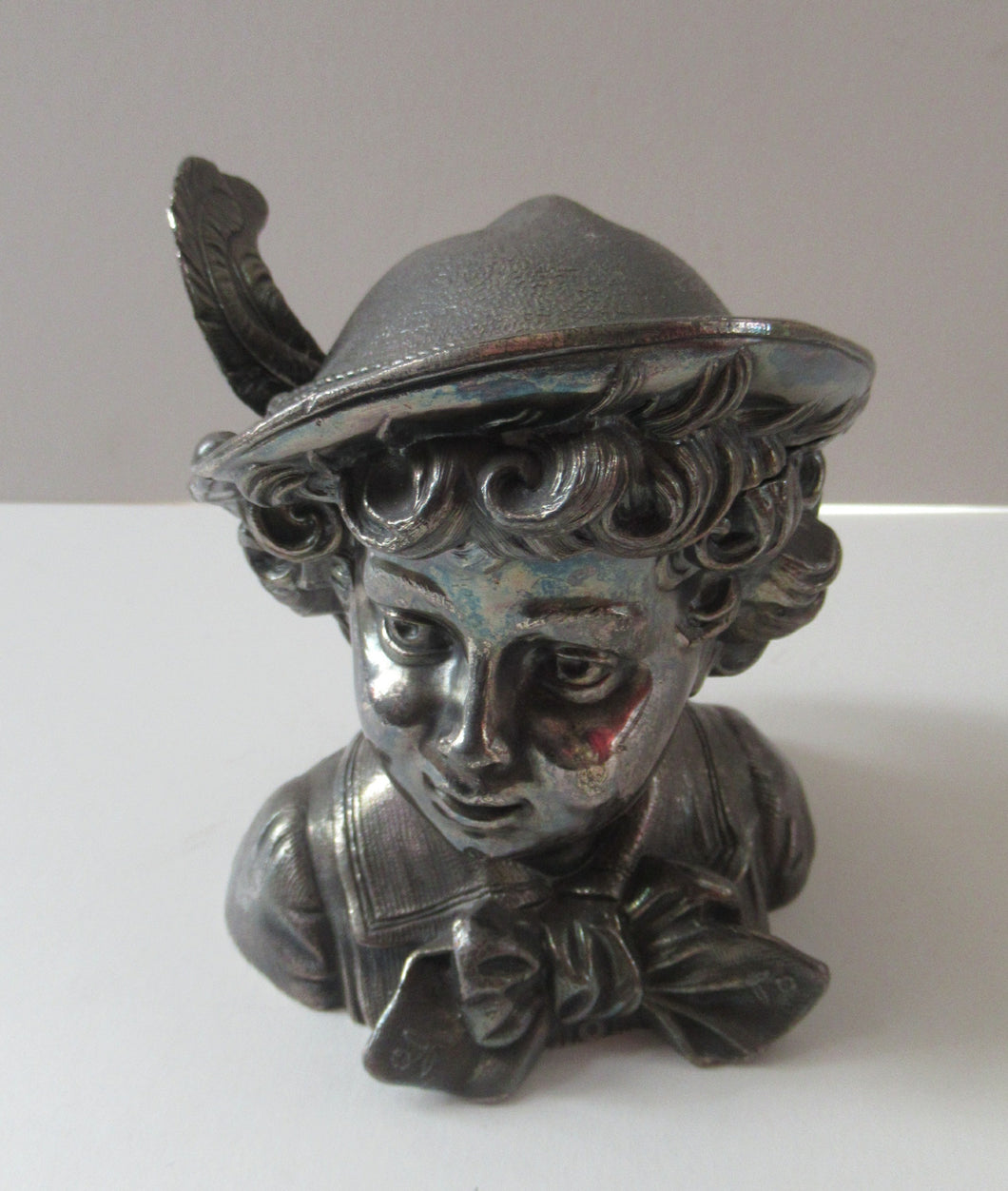 Antique Silver Plate Inkwell. Young Austrian Boy Wearing a Hat with Large Feather  
