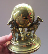 Load image into Gallery viewer, Antique Victorian Brass Inkwell. Three Greyhounds Supporting a Globe Shape Ball
