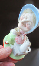 Load image into Gallery viewer, Antique Porcelain Nodder Figurine by Schafer &amp; Vater. Old Lady in Garden Drinking Tea 
