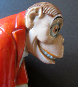 1920s SCHAFER & VATER Nipper Flask or Bottle in the Form of a Comical Monkey Opening a Bottle