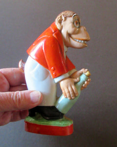 1920s SCHAFER & VATER Nipper Flask or Bottle in the Form of a Comical Monkey Opening a Bottle