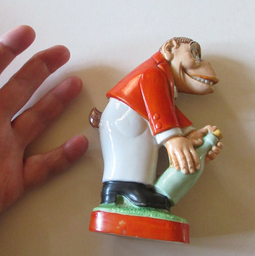 1920s SCHAFER & VATER Nipper Flask or Bottle in the Form of a Comical Monkey Opening a Bottle