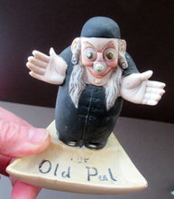 Load image into Gallery viewer, Antique Miniature Bisque Porcelain Figure by Schafer &amp; Vater.  Set Onto a Quirky Ashtray Entitled &quot;The Old Pal&quot;
