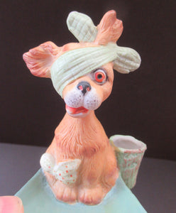 Bisque Porcelain Figure by Schafer & Vater. Comical Dog Model Set Onto an Ashtray