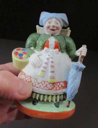 Bisque Porcelain Figure by Schafer & Vater. Match Holder in the Form of a Lady Carrying a Basket 