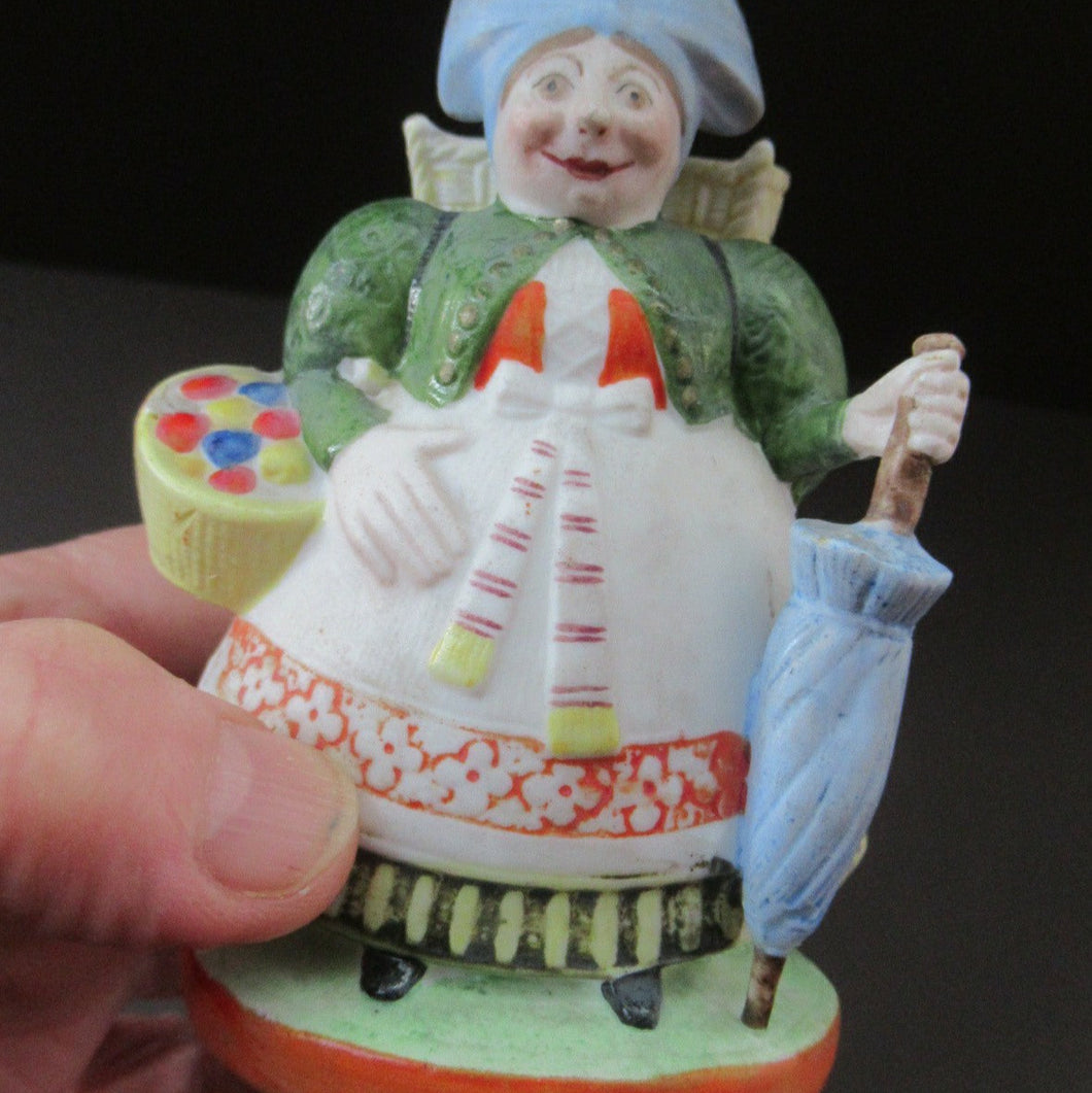 Bisque Porcelain Figure by Schafer & Vater. Match Holder in the Form of a Lady Carrying a Basket 