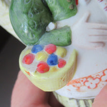 Load image into Gallery viewer, Bisque Porcelain Figure by Schafer &amp; Vater. Match Holder in the Form of a Lady Carrying a Basket 
