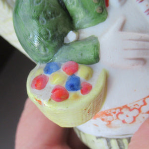 Bisque Porcelain Figure by Schafer & Vater. Match Holder in the Form of a Lady Carrying a Basket 